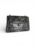 Bolso efecto serpiente